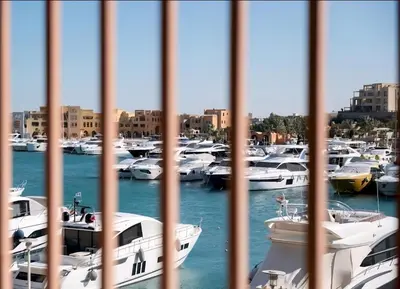 a bunch of boats are docked in a harbor at Luxury Stays in New Marina El Gouna in Hurghada