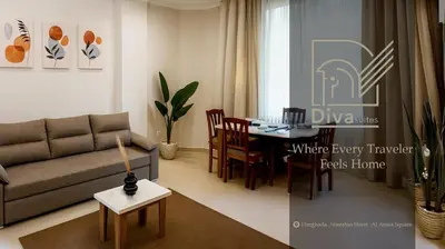 a living room with a couch and a table at Diva Suites in Hurghada