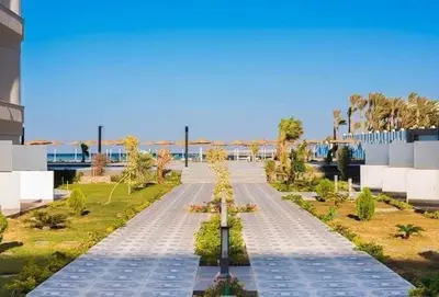 an empty street in front of a building at Scandic resort in Hurghada