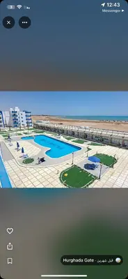 a screenshot of a picture of a swimming pool at Oasis marina in Hurghada