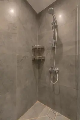 a shower with a shower head in a bathroom at Soulful Studio in Bali El Gouna in Hurghada
