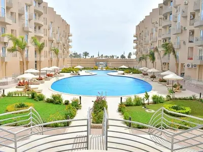 an image of a swimming pool at a resort at Luxury apartment With sea view and free beach in Hurghada