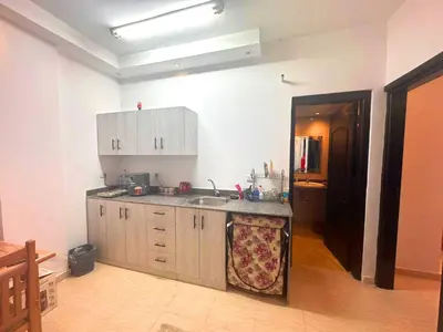 a kitchen with a sink and a counter top at Home 2 Bedroom in Hurghada in Hurghada