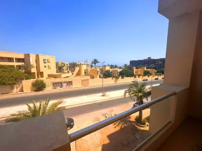 a view of a city street from a balcony at Home 2 Bedroom in Hurghada in Hurghada