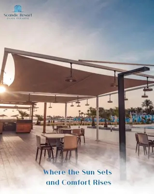 a patio with tables and chairs under a canopy at Scandic resort in Hurghada