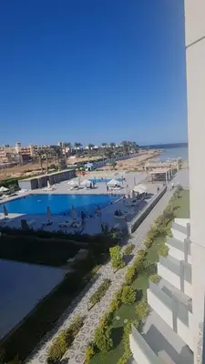 an overhead view of a swimming pool at a resort at Scandic resort in Hurghada