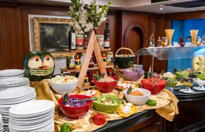 a table filled with plates and bowls of food at Nile cruise from Luxor to Aswan 4 nights From Aswan to Luxor 3 nights in Luxor