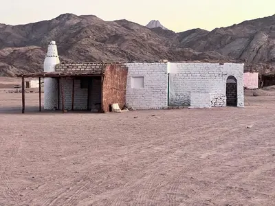 a brick building in the middle of the desert at Scenery Khalaf malky in Hurghada