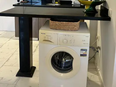 a washing machine with a counter on top of it at Cozy 1-Bedroom Chalet with Sea View in Hurghada