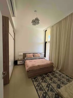 a bedroom with a bed and a window at G Crips View in Hurghada
