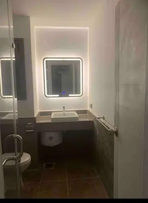 a bathroom with a sink and a toilet on an airplane at استوديوا بالجونه in Hurghada