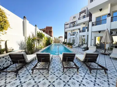 an image of a swimming pool in a villa at Arabian Suites by Imperial 1 bed Apartment in Hurghada