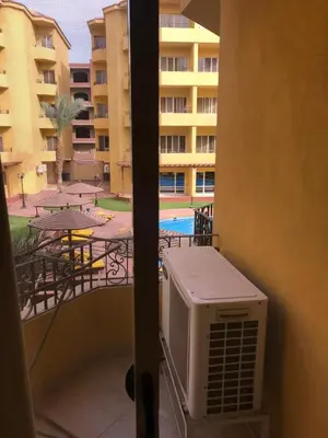 a view of a balcony with an air conditioner at Premier group in Hurghada