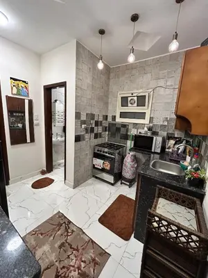 a kitchen with a sink and a stove at studio for rent in Hurghada