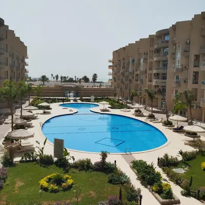 an overhead view of a swimming pool in a resort at Princess Resort, Hurghada in Hurghada