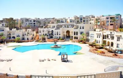 a large swimming pool in the middle of a city at Azzura Sahl Hasheesh in Hurghada