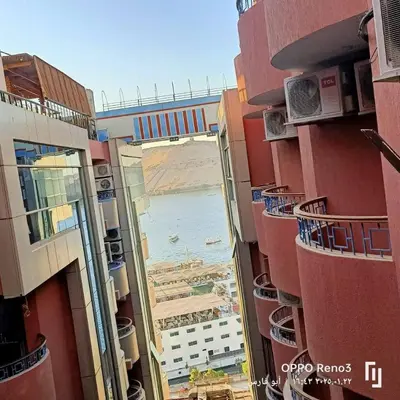 a view of the ocean from the balcony of a building at شقة فاخرة اسوان in Aswān