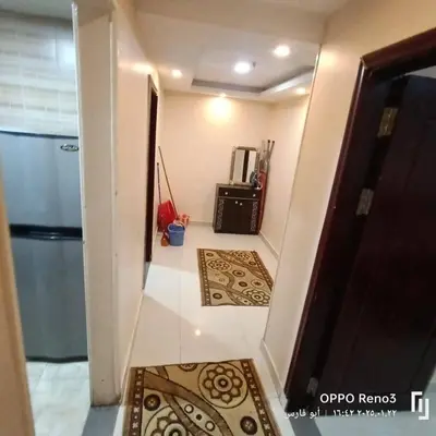 a room with a hallway with a door and a floor at شقة فاخرة اسوان in Aswān