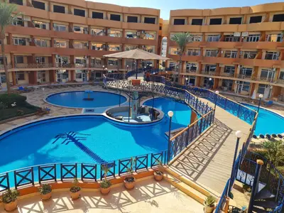 an overhead view of a hotel with two pools at Oasis Resort Soraya - 2 bed apt, recently renovated and fully furnished with pool views in Al Ahyaa Hurghada Egypt in Hurghada