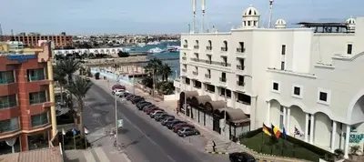 an aerial view of a city with a white building at 2 bedroom apartment in Prestige Plaza in Hurghada