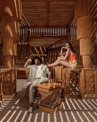a man and a woman sitting on benches in a room at رحلات بحرية دولفين وغواصة وجزر in Hurghada