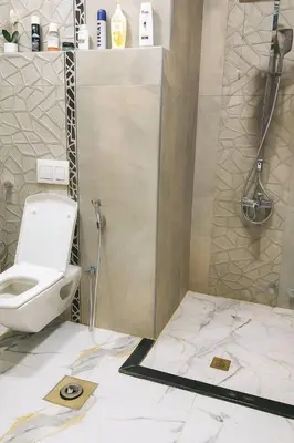 a bathroom with a toilet and a shower at Hurghada Sky Villa in Hurghada