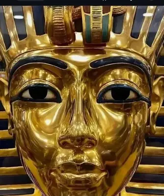 a gold mask with a face on it at New Alsalam Hotel in Luxor