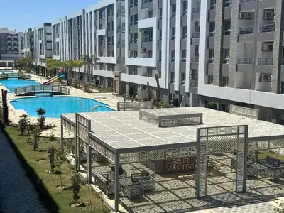 an overhead view of a swimming pool in a building at Fanadir Bay in Hurghada