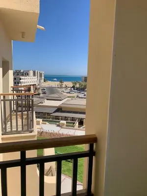 a balcony with a view of the ocean at for the best all-rounder sea view Hurghada Apartment&DownTown AlDau in Banī Ghālib