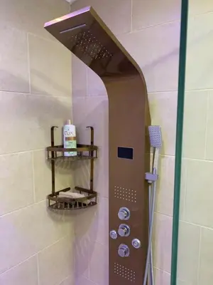 a bathroom with a shower with a glass door at for the best all-rounder sea view Hurghada Apartment&DownTown AlDau in Banī Ghālib
