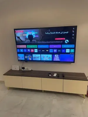 a large flat screen tv hanging on a wall at Special Apartment For Rent 103 in Hurghada