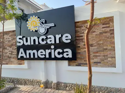 a sign for the entrance of an america sign on a building at Suncare America Resort - luxury rooms in Hurghada