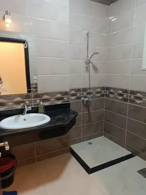 a bathroom with a sink and a shower at Hurghada Sea view with pool in Hurghada