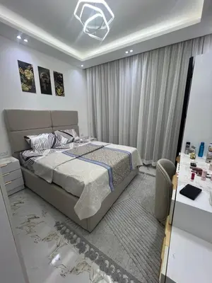 a bedroom with a large bed in a room at La Bela Resort in Hurghada