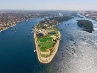 an island in the middle of a body of water at Safy Guest House in Aswan