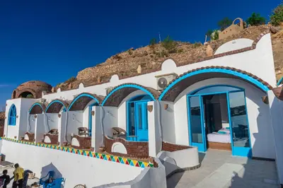 a house on the side of a hill at Nubian Spirit in Aswân Reservoir Colony