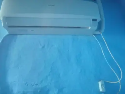 a nintendo wii game console with a cord sticking out at Arman House in Aswan