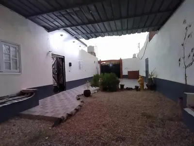 a courtyard of a building with a fire hydrant at SAMA HOUSE Cozy Mountain Hideaway in Luxor in ‘Ezbet Abu Ḥabashi
