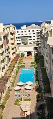 an aerial view of a resort with a pool and buildings at Florenza Resort - Roboost - Hurghada in Hurghada