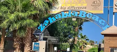 a sign for the disneyland resort with palm trees at Florenza Resort - Roboost - Hurghada in Hurghada