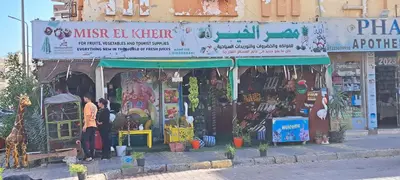 a man standing in front of a misler kitchen store at Florenza Resort - Roboost - Hurghada in Hurghada