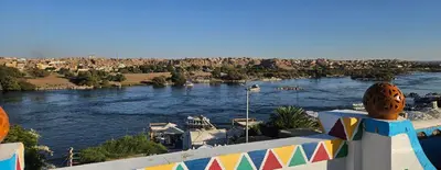 a view of a river with boats on it at ASKALEIH Nubian Guest House in Aswan