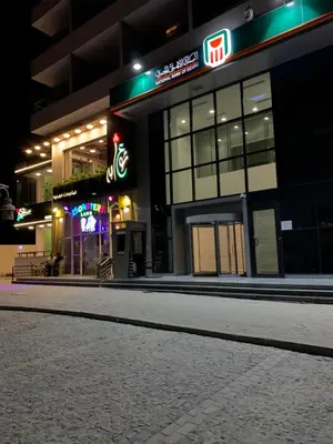 an empty street in front of a building at night at Hurghada concierge at La Prestigia B2 4 in Hurghada