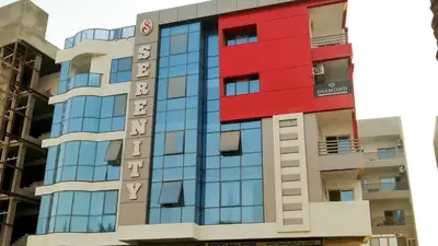a view of the facade of a building at Stylish Sunny Central 1BR in Hurghada