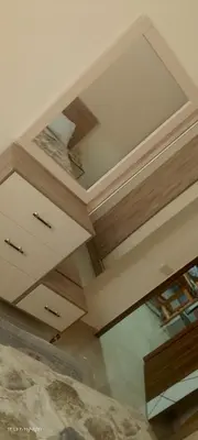 a room with a ceiling with wood at جولدن طيبه الذهبيه in Hurghada