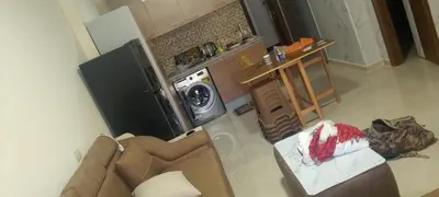 an overhead view of a kitchen with a living room at جولدن طيبه الذهبيه in Hurghada