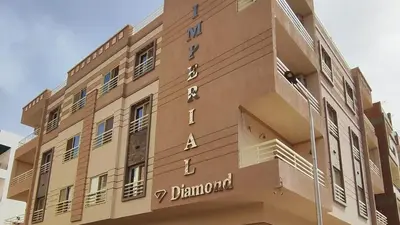 a building with the name of a pharmacy on it at Comfort quiet central new flat in Hurghada