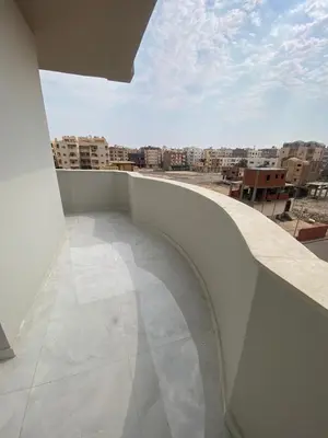a balcony with a view of a city at Private 3 bedroom apartment in Hurghada