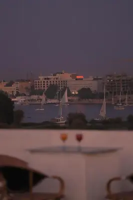 a view of a harbor with boats in the water at King Nile Luxor in Luxor