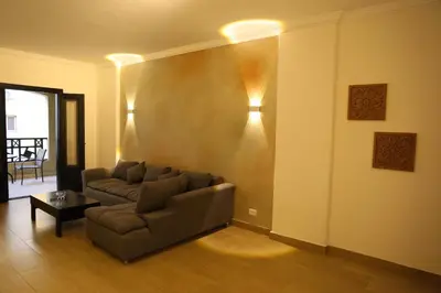 a living room with a couch and a table at Casa Hurghada in Hurghada